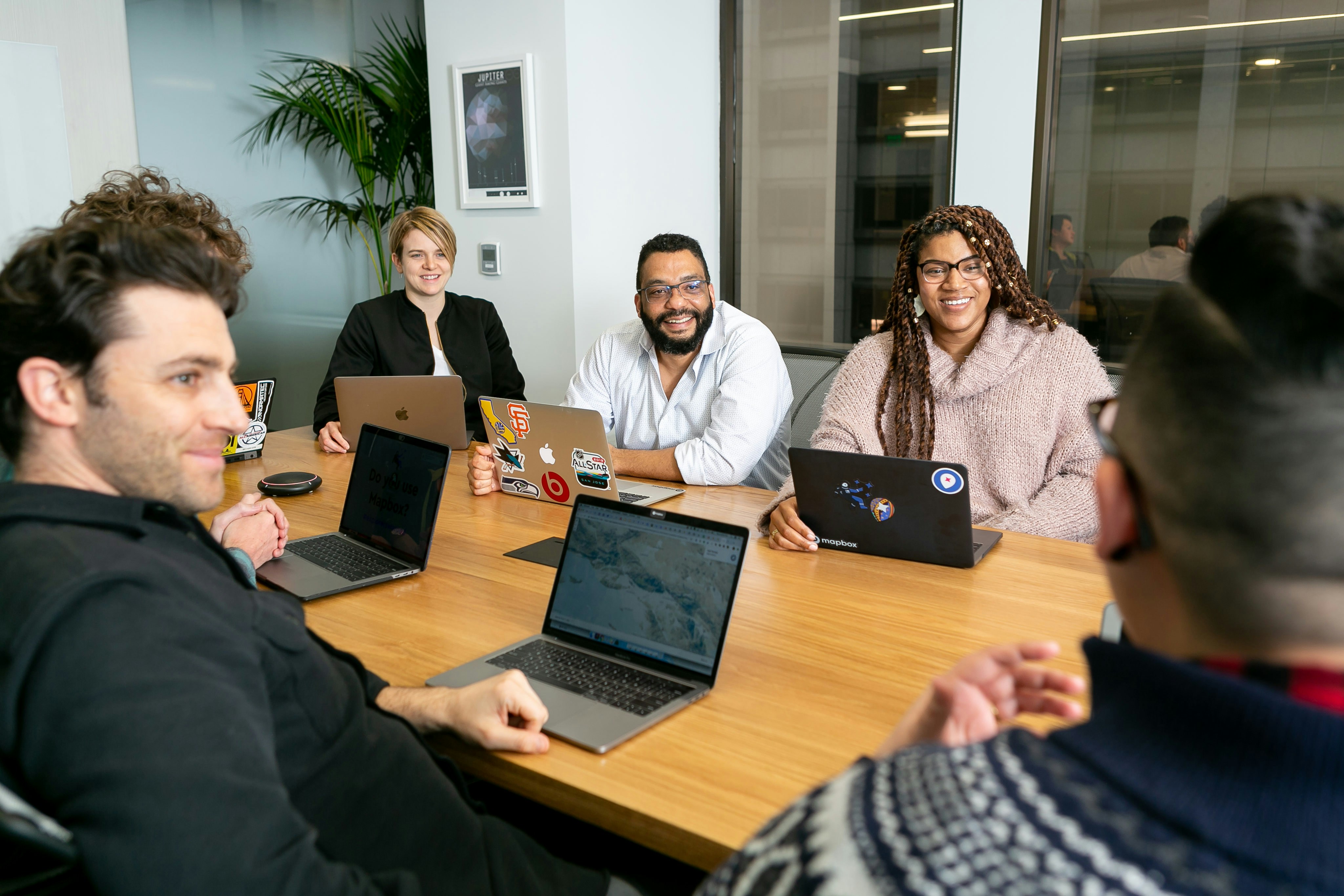 Business team collaborating on lead generation strategy using Quantonix platform